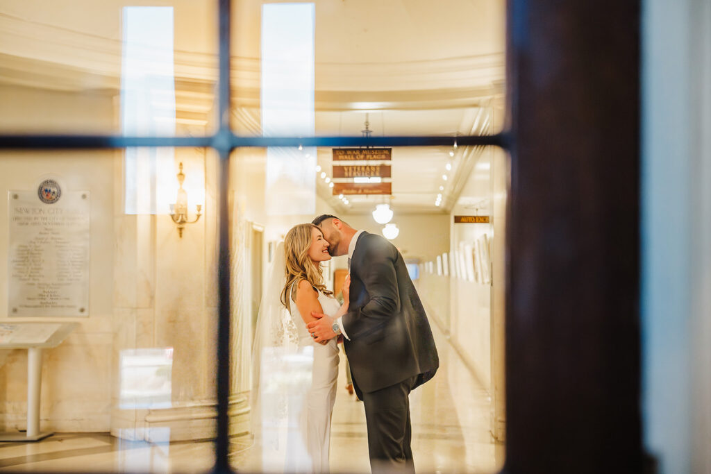 Couple getting ready together before intimate Boston elopement