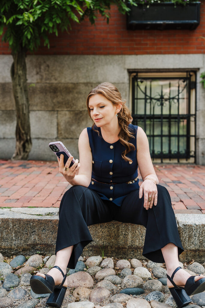 Boston lifestyle branding photographer captures entrepreneur working on location in the city.